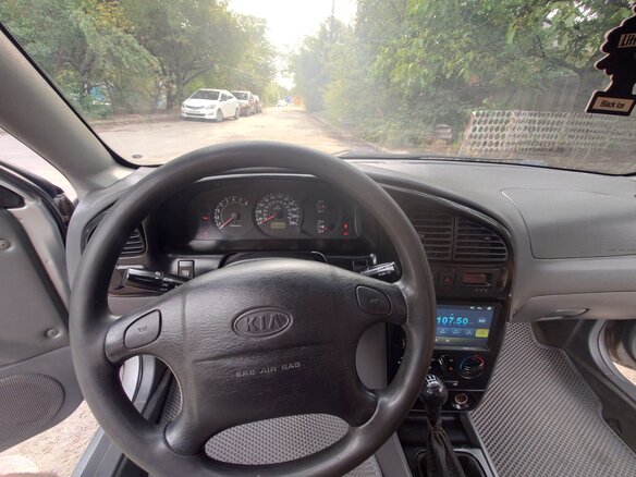 2005 Kia Spectra I Рестайлинг 2, серебристый, 200000 рублей - вид 8