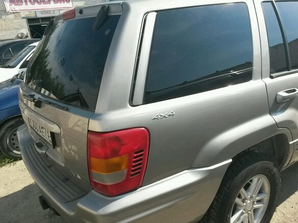 2000 Jeep Grand Cherokee II (WJ), серебристый - вид 4