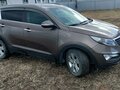 2011 Kia Sportage III, коричневый, 830000 рублей - вид 2
