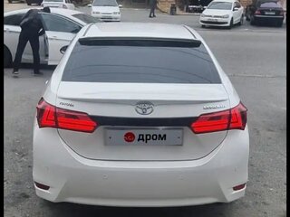 2014 Toyota Corolla XI (E160, E170, E180), белый, 1450000 рублей, вид 3