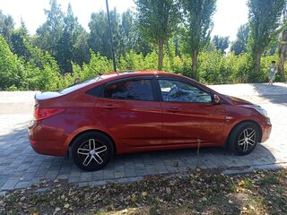 2011 Hyundai Solaris I, красный, 650000 рублей, вид 2