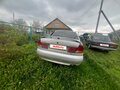 1998 Mitsubishi Carisma I, серый, 125000 рублей - вид 3