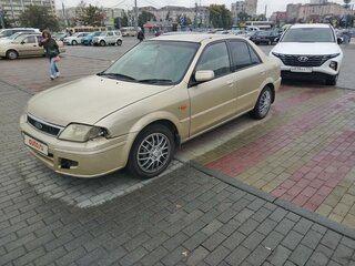 2001 Ford Laser IV, бежевый, 150000 рублей, вид 1
