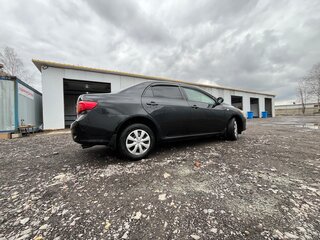 2008 Toyota Corolla X (E140, E150), чёрный, 720000 рублей, вид 2