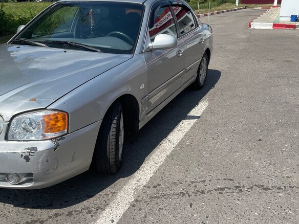 2004 Kia Magentis I Рестайлинг, серебристый - вид 1