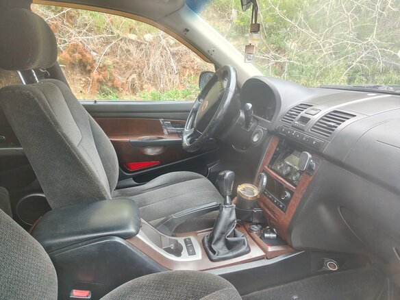 2009 SsangYong Rexton II, чёрный, 750000 рублей - вид 2