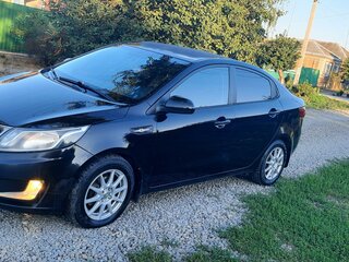 2012 Kia Rio III, чёрный, 670000 рублей, вид 1