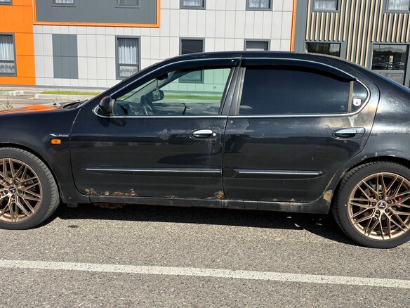 2001 Nissan Maxima V (A33), чёрный, 300000 рублей - вид 10