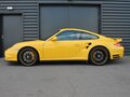 2009 Porsche 911 Turbo VI (997) Рестайлинг, жёлтый - вид 2