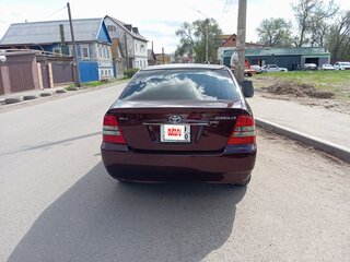 2002 Toyota Corolla IX (E120, E130), красный, 500000 рублей, вид 3