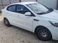 2015 Kia Rio III Рестайлинг, белый, 900000 рублей - вид 1