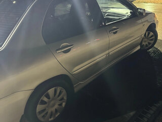 2005 Mitsubishi Lancer IX Рестайлинг, серебристый, 550000 рублей, вид 2