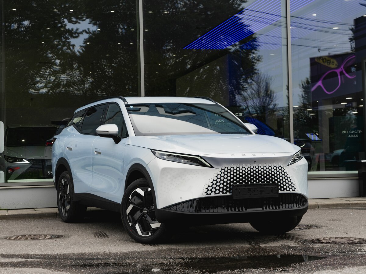 Открыть фотографии: Omoda C7
