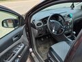 2009 Ford Focus II Рестайлинг, коричневый, 580000 рублей - вид 4