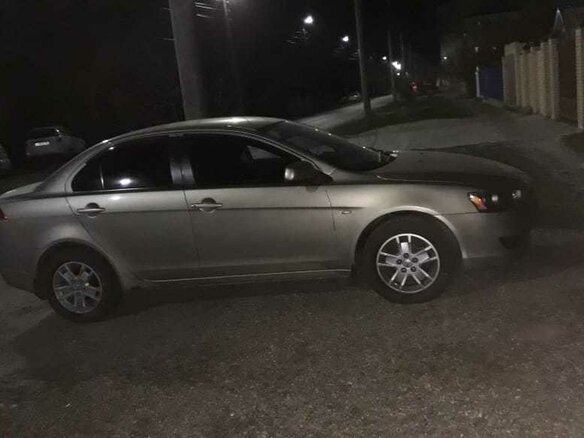 2009 Mitsubishi Lancer X, золотистый - вид 2