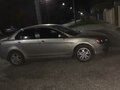 2009 Mitsubishi Lancer X, золотистый - вид 2
