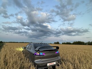 2008 Mitsubishi Lancer X, серый, 950000 рублей, вид 3