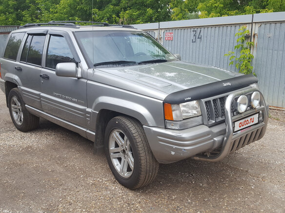 1997 Jeep Grand Cherokee I (ZJ) Рестайлинг, серебристый - вид 2
