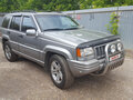 1997 Jeep Grand Cherokee I (ZJ) Рестайлинг, серебристый - вид 2