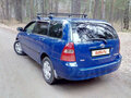 2004 Toyota Corolla IX (E120, E130), синий - вид 4