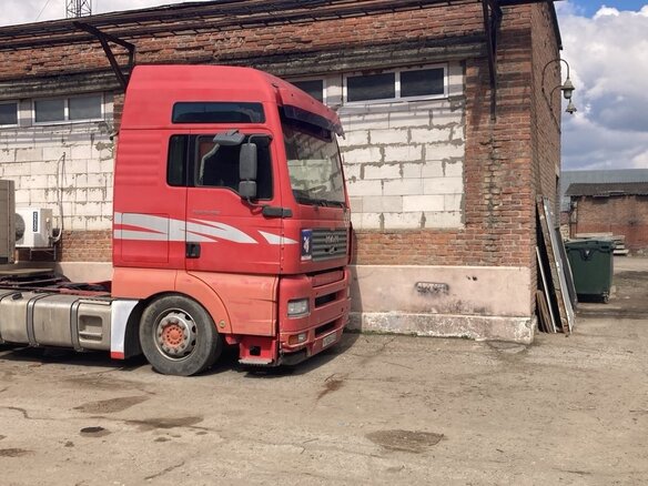 2004 MAN TGA, красный, 1000000 рублей - вид 1