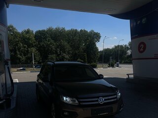 2014 Volkswagen Tiguan I Рестайлинг, коричневый, 1310000 рублей, вид 1