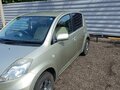 2010 Toyota Passo I (C10), золотистый, 400000 рублей - вид 4