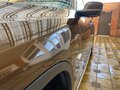 2011 BMW X1 20i I (E84), коричневый, 1850000 рублей - вид 2