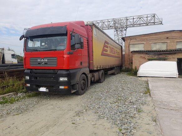 2007 MAN TGA, красный, 2100000 рублей - вид 1