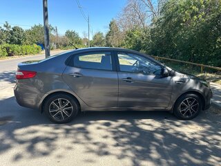 2014 Kia Rio 6-speed III, серый, 1200000 рублей, вид 3