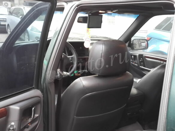 1998 Jeep Grand Cherokee I (ZJ) Рестайлинг, зелёный - вид 8