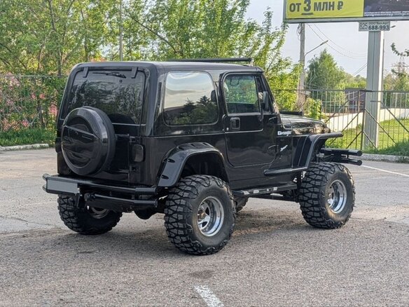 1993 Jeep Wrangler I (YJ), чёрный, 2000000 рублей - вид 2