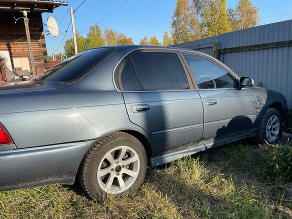 1992 Toyota Corolla VII (E100), синий - вид 13