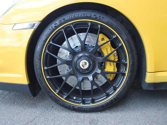 2009 Porsche 911 Turbo VI (997) Рестайлинг, жёлтый - вид 14