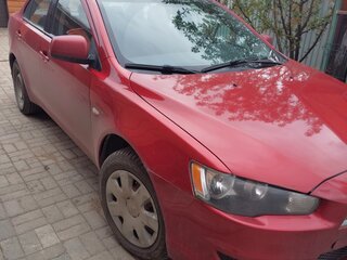 2007 Mitsubishi Lancer X, красный, 650000 рублей, вид 1