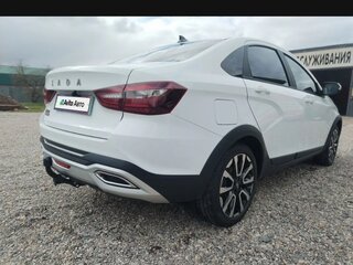 2024 Lada (ВАЗ) Vesta I Рестайлинг (NG), белый, 1800000 рублей, вид 1