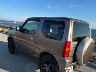 2013 Suzuki Jimny Kei car III Рестайлинг 2, коричневый, 950000 рублей, вид 2