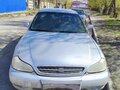1999 Kia Clarus II, серебристый, 220000 рублей - вид 1