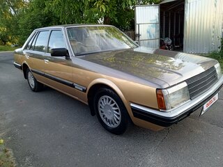 1987 Nissan Laurel V (C32), коричневый, 1100000 рублей, вид 3