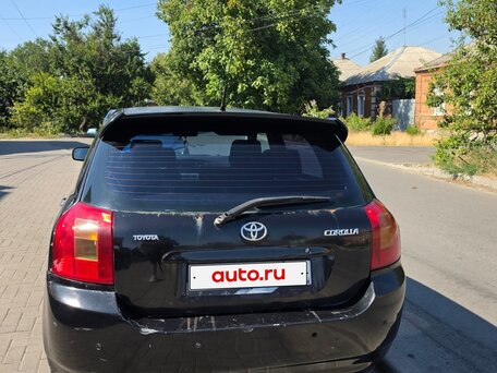 2002 Toyota Corolla IX (E120, E130), чёрный, вид 3