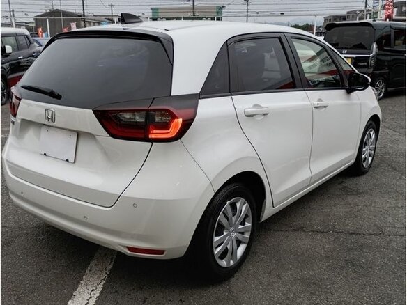 2024 Honda Fit IV Рестайлинг, белый, 1110014 рублей - вид 4