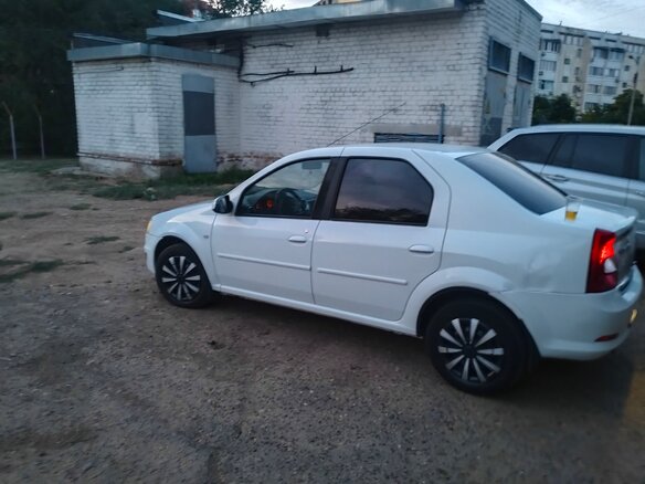 2011 Renault Logan I Рестайлинг, белый, 570000 рублей - вид 14