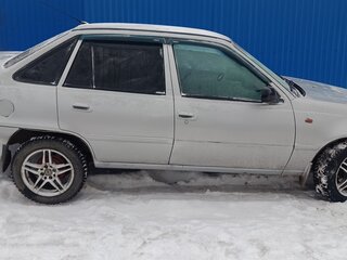 2010 Daewoo Nexia I Рестайлинг, серебристый, 185000 рублей, вид 4