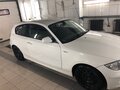 2011 BMW 1 серии 116i I (E81/E82/E87/E88) Рестайлинг, белый - вид 1