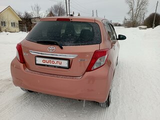 2012 Toyota Vitz III (XP130), оранжевый, 810000 рублей, вид 4