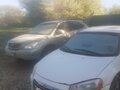 2004 Chrysler Sebring II Рестайлинг, белый
