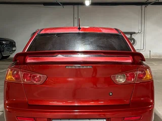 2007 Mitsubishi Lancer X, красный, 750000 рублей, вид 2