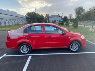 2010 Chevrolet Aveo I Рестайлинг, красный, 380000 рублей, вид 2