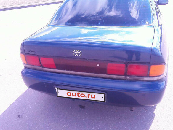 1994 Toyota Sprinter VII (E100), синий - вид 3