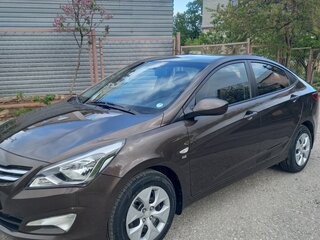 2015 Hyundai Solaris I Рестайлинг, коричневый, 1359000 рублей, вид 1